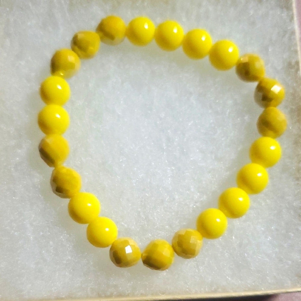 Handmade by my daughter. Yellow Beaded Bracelet